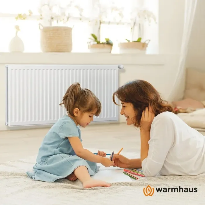 Радиатор Warmhaus стальной панельный 500х22х600 бок